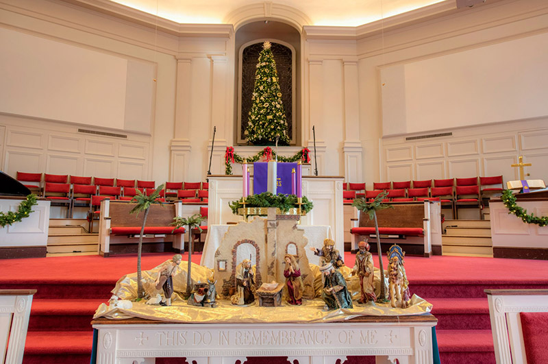 Front of the sanctuary at Huguenot Road Baptist Church decorated for Christmas