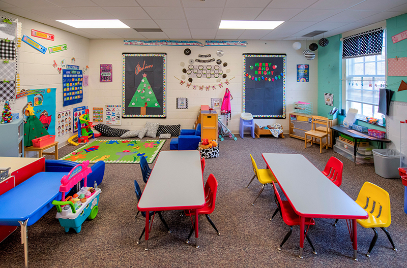 Children's room at Huguenot Road Baptist Church with tables and colorful chairs