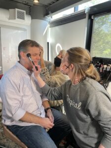 Bob Lee in a makeup chair for Chick-Fil-A commercial